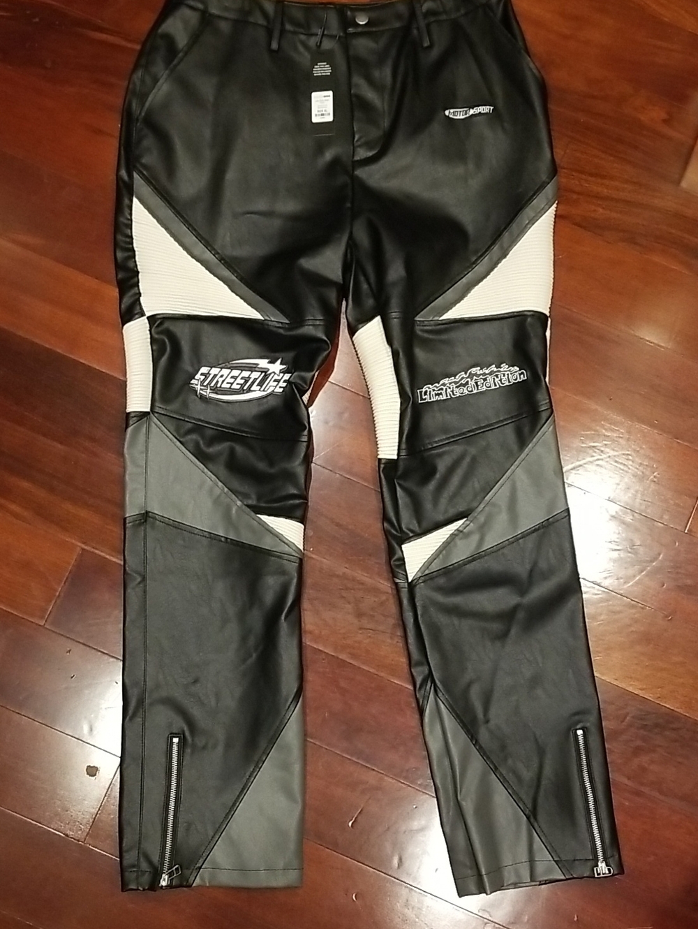 Fashion Nova Black and Cream Paneled Moto Jeans